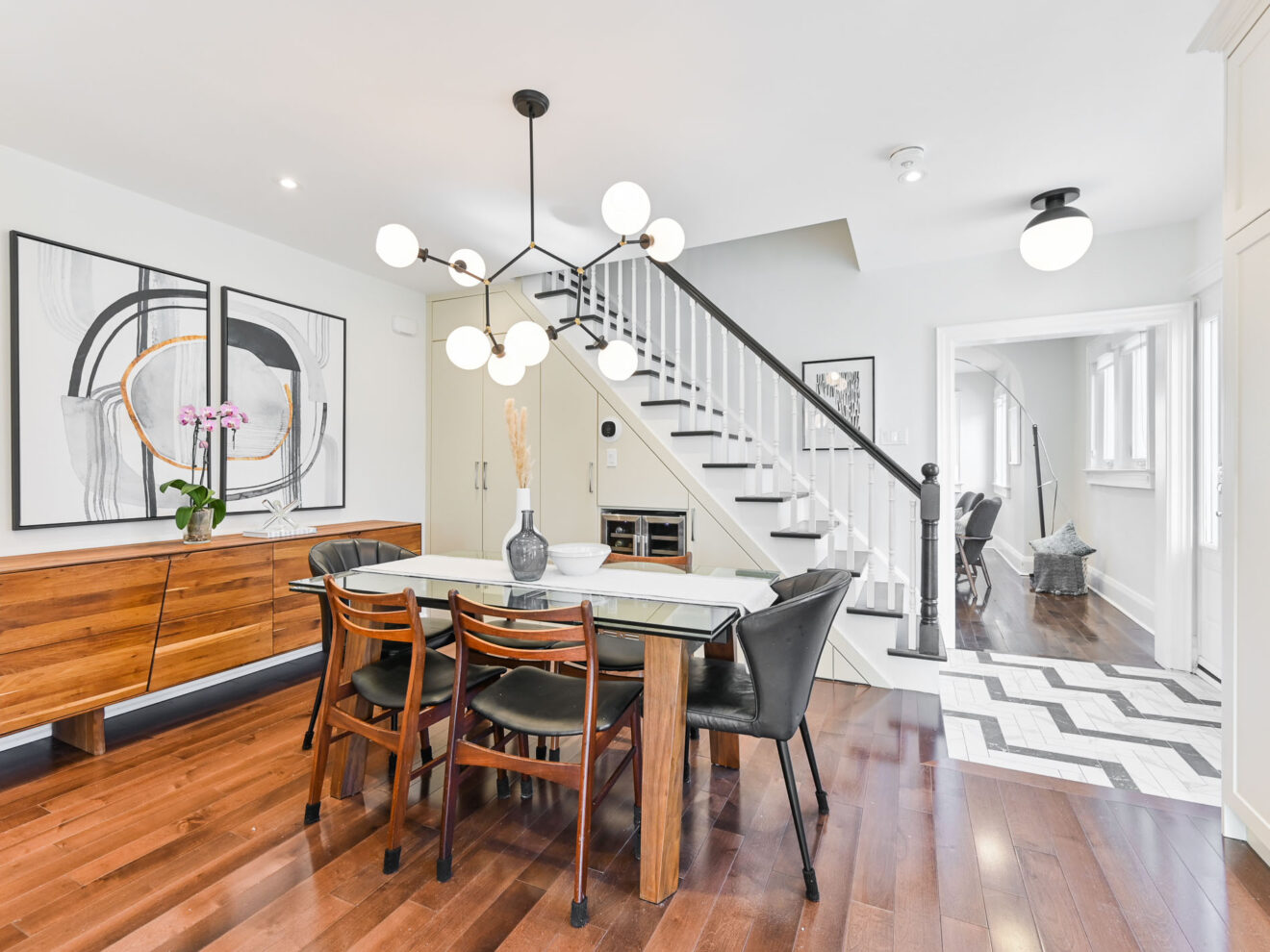 2 Lemay Road - dining room featuring staircase, hidden shoe closet, and built-in wine fridge